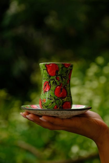 Decorative pear cup with saucer