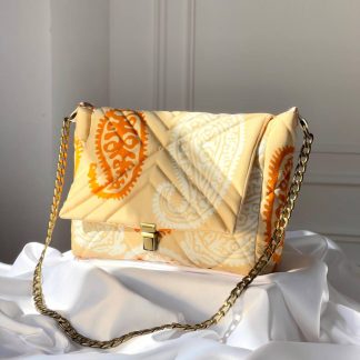 Square beige bag with gold chain
