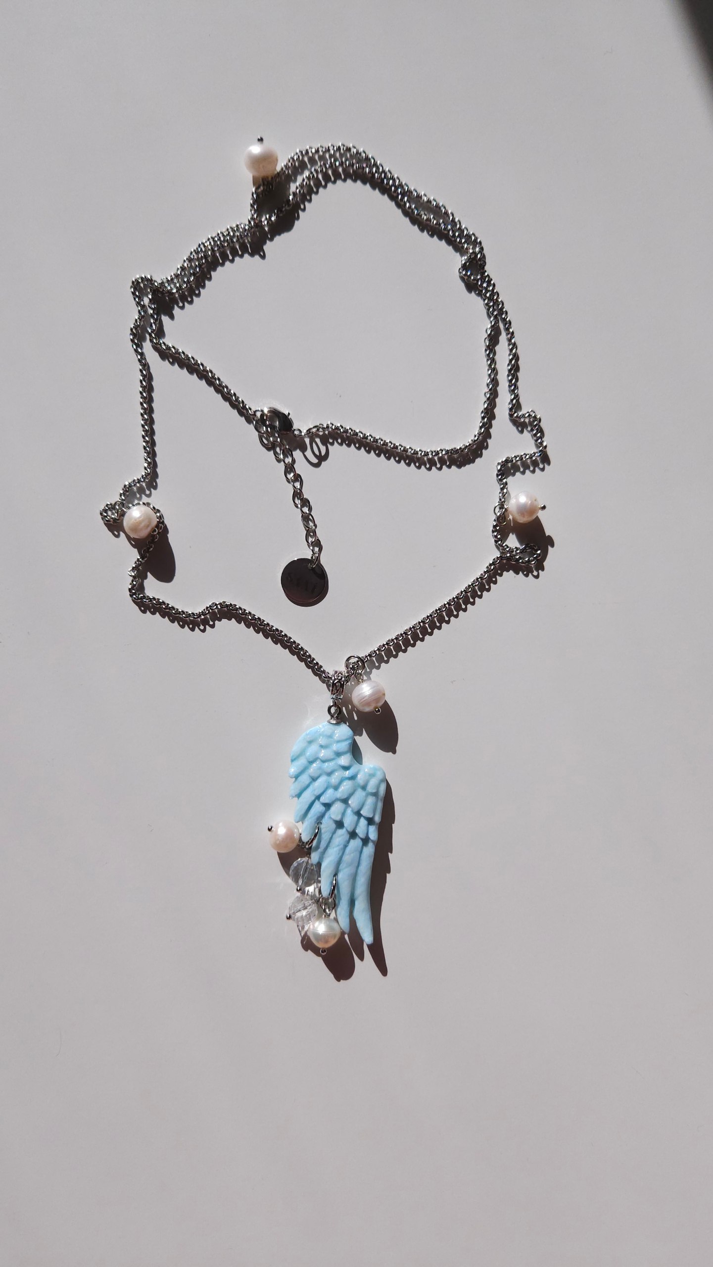 Polimer gildən hazırlanmış əl işi qanad amulet