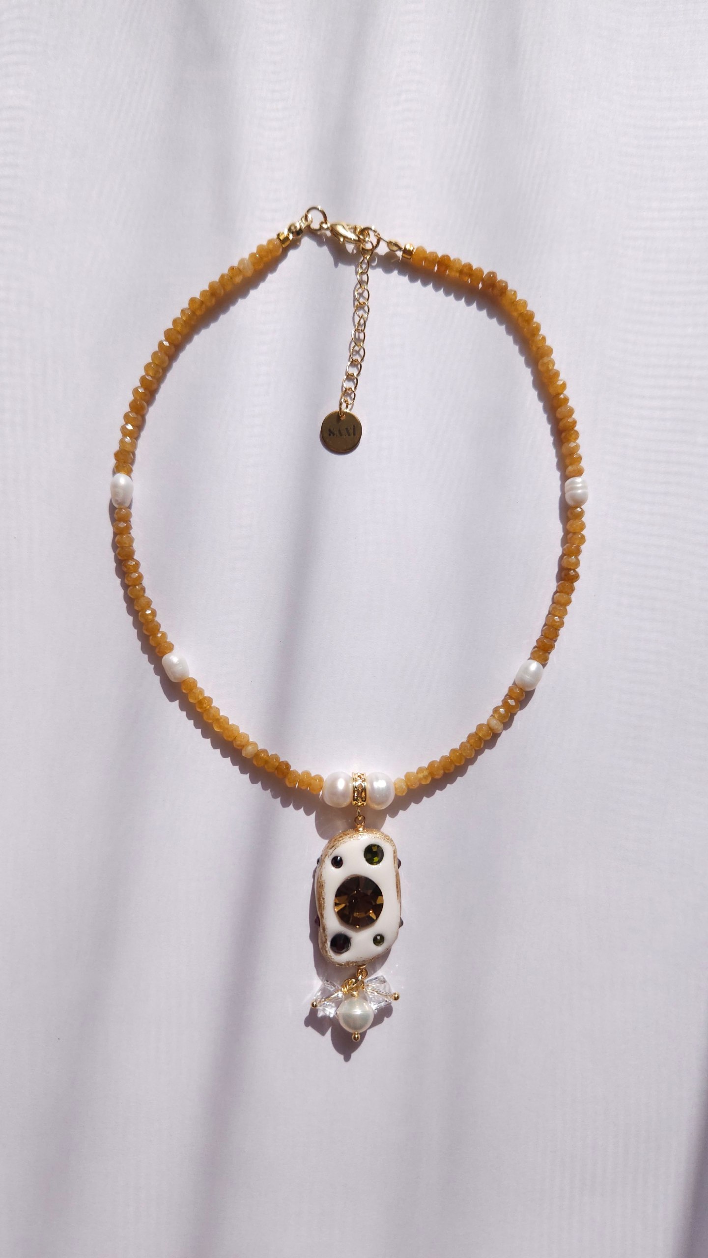 Polimer gildən hazırlanmış əl işi amulet