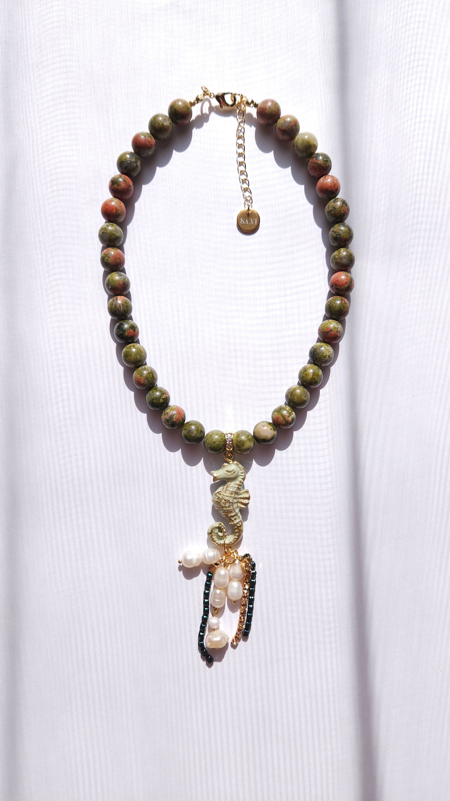 Polimer gildən hazırlanmış əl işi dəniz atı amulet