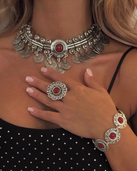 Set with red stones